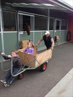 John working hard with the grandkids in for a ride...